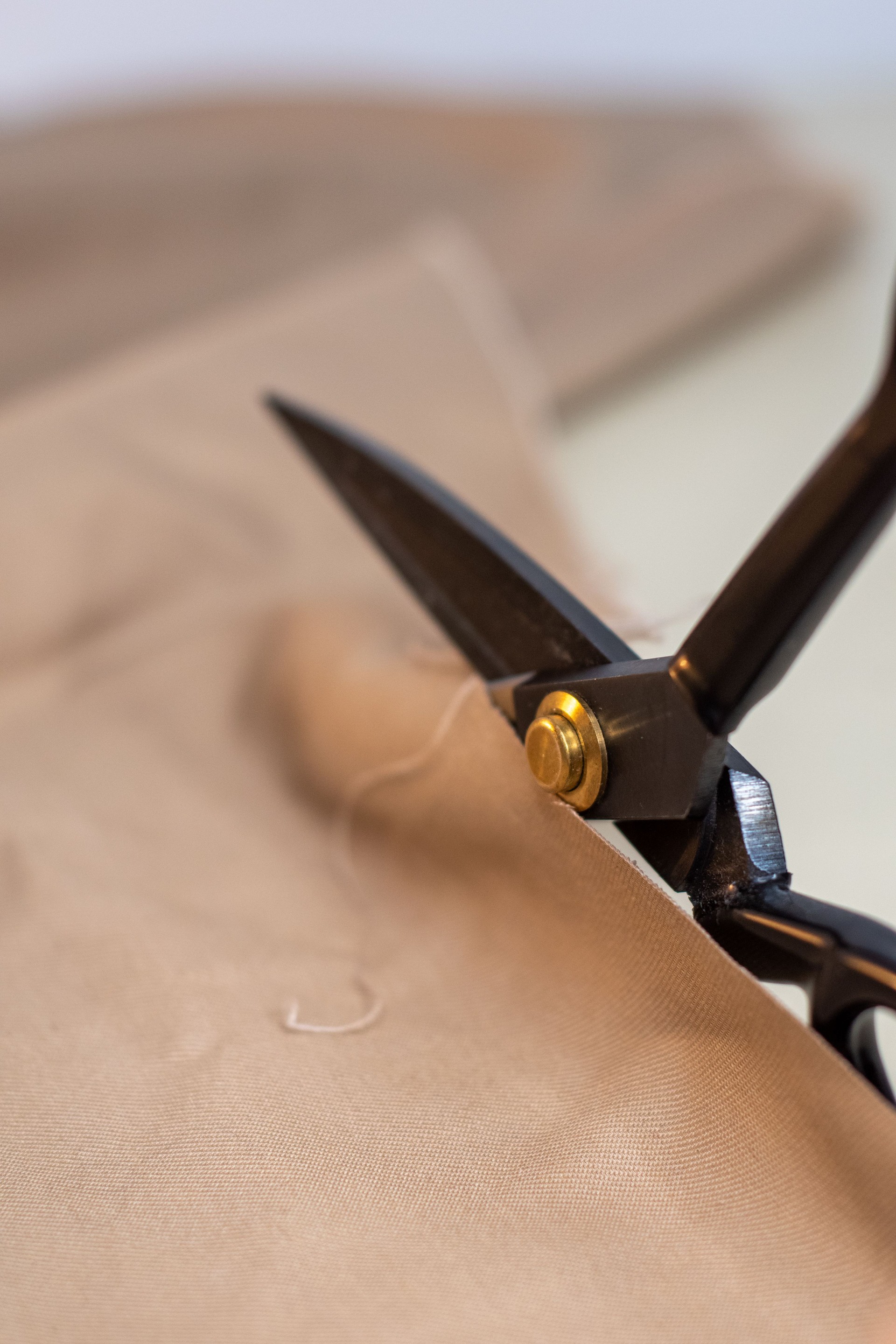 scissors cutting textile for sewing.